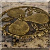 K14. Metal pear trivet. 7”w - $10